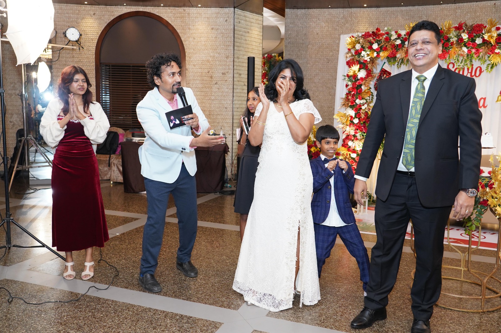 Hosting a celebration with family on stage