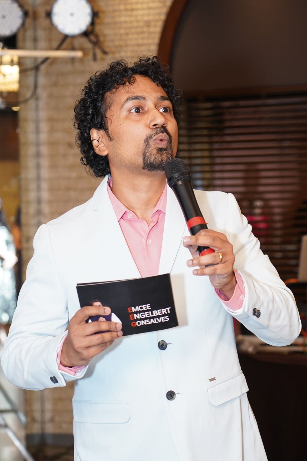 Emcee mid-speech